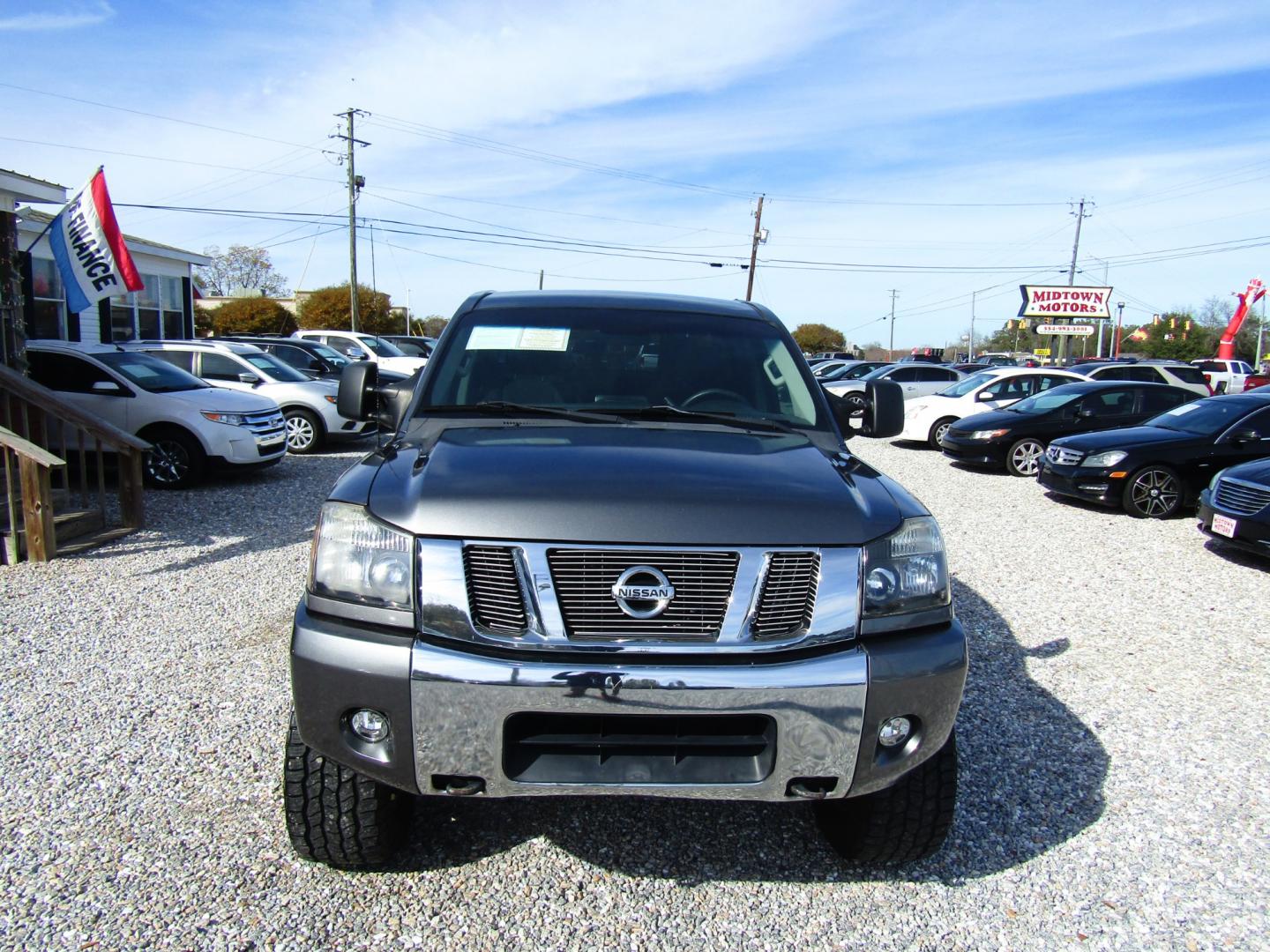 2013 Gray /Gray Nissan Titan SV Crew Cab 4WD (1N6AA0EJ3DN) with an 5.6L V8 DOHC 32V engine, Automatic transmission, located at 15016 S Hwy 231, Midland City, AL, 36350, (334) 983-3001, 31.306210, -85.495277 - Photo#1